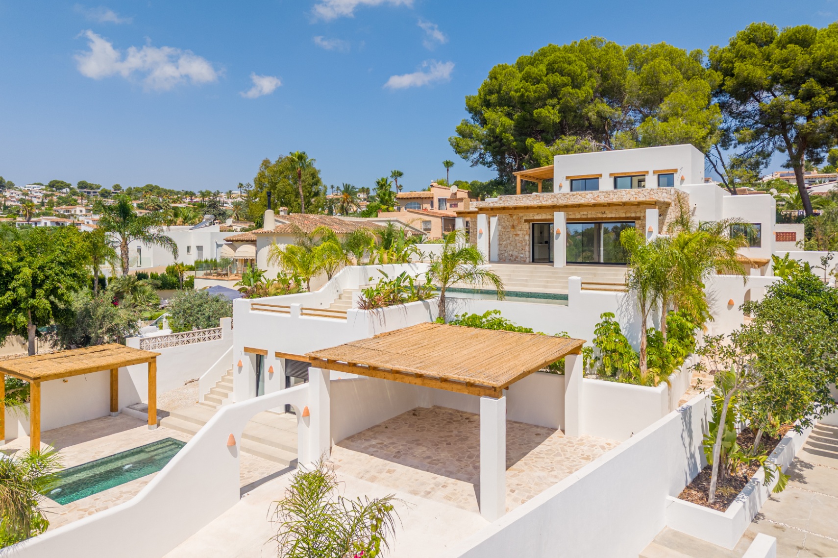 12680NS - Luxury Ibiza-Style Villa for Sale in Moraira with Panoramic Sea Views