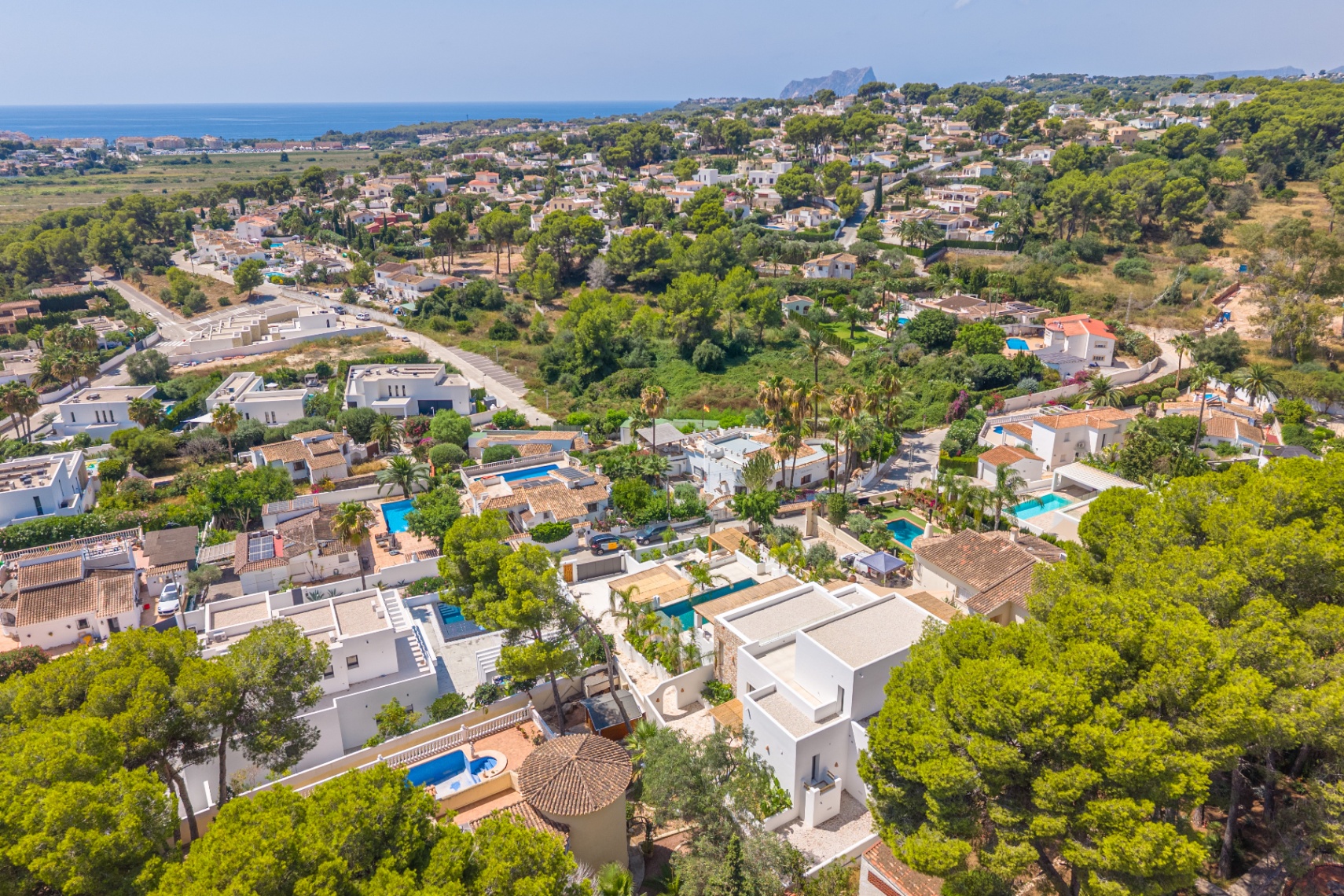 12680NS - Luxury Ibiza-Style Villa for Sale in Moraira with Panoramic Sea Views