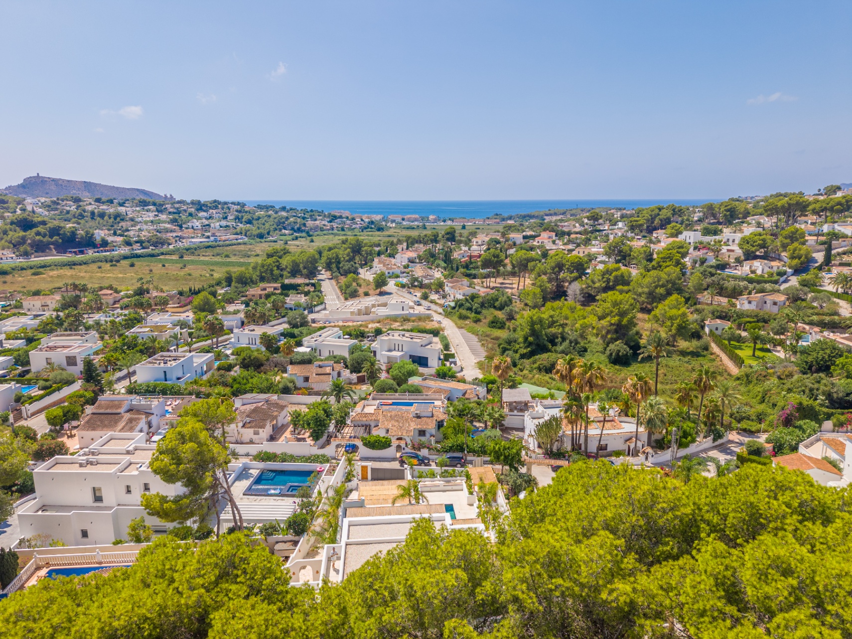 12680NS - Luxury Ibiza-Style Villa for Sale in Moraira with Panoramic Sea Views