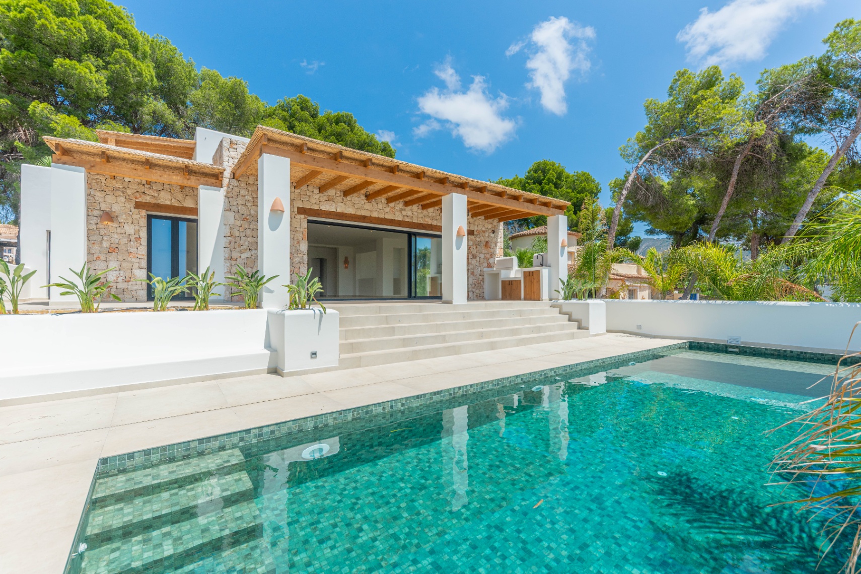 12680NS - Luxury Ibiza-Style Villa for Sale in Moraira with Panoramic Sea Views