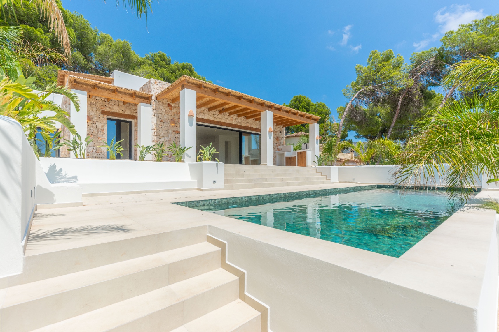 12680NS - Luxury Ibiza-Style Villa for Sale in Moraira with Panoramic Sea Views