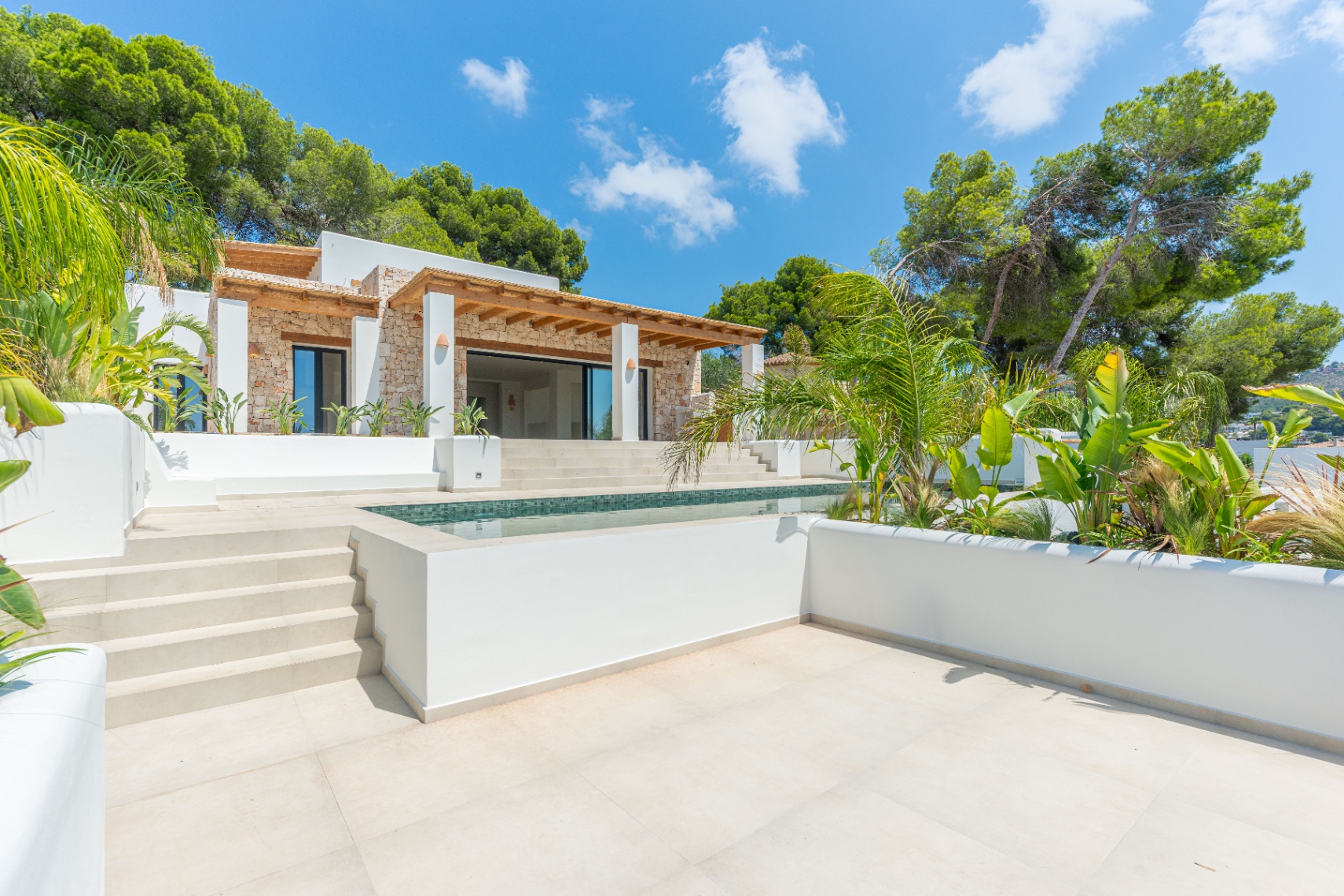 12680NS - Luxury Ibiza-Style Villa for Sale in Moraira with Panoramic Sea Views