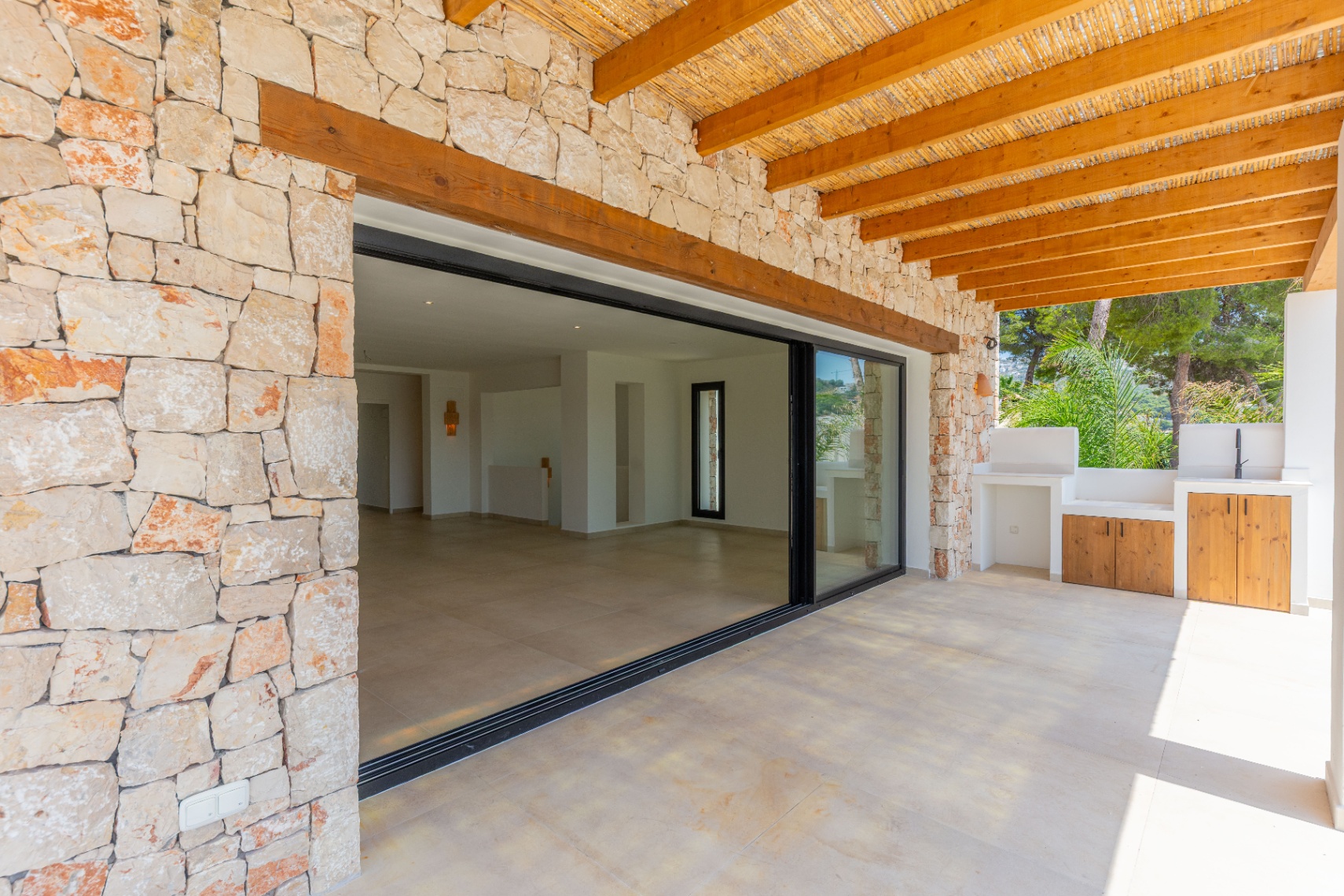12680NS - Luxury Ibiza-Style Villa for Sale in Moraira with Panoramic Sea Views