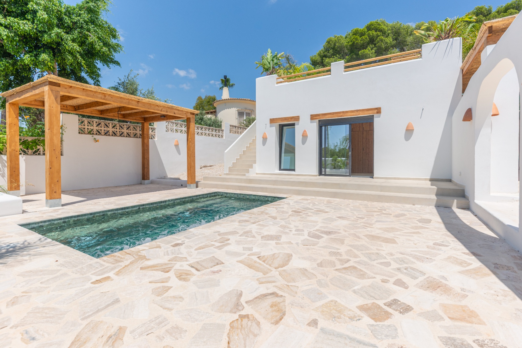 12680NS - Luxury Ibiza-Style Villa for Sale in Moraira with Panoramic Sea Views