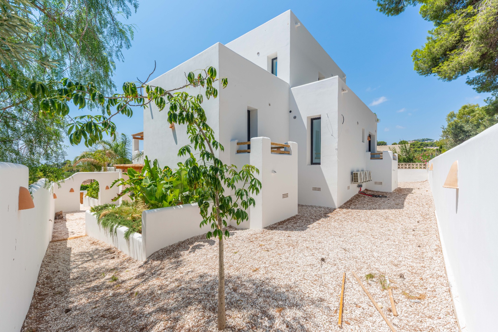 12680NS - Luxury Ibiza-Style Villa for Sale in Moraira with Panoramic Sea Views