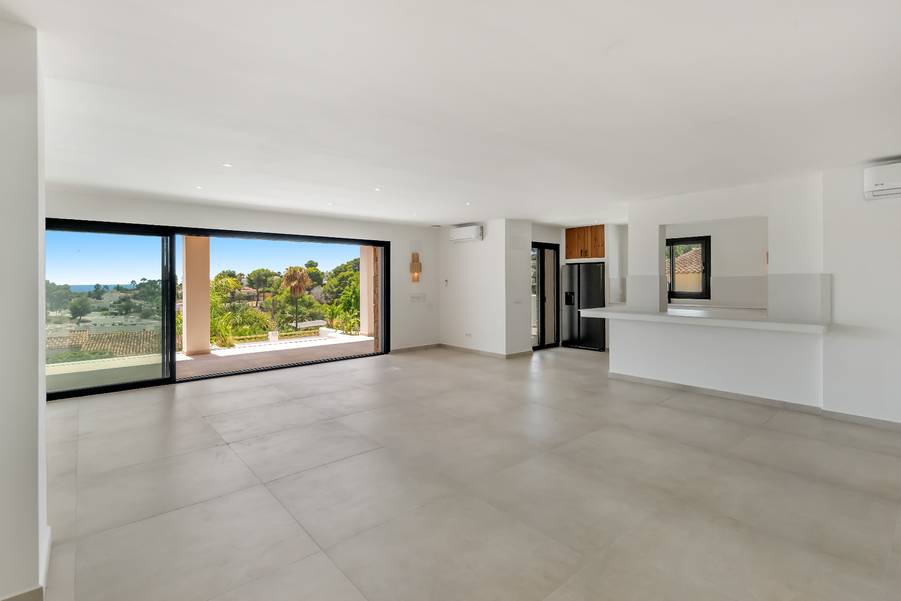 12680NS - Luxury Ibiza-Style Villa for Sale in Moraira with Panoramic Sea Views