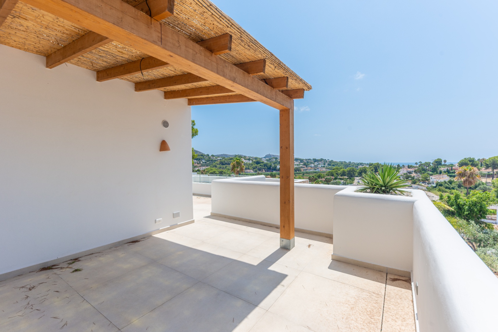 12680NS - Luxury Ibiza-Style Villa for Sale in Moraira with Panoramic Sea Views