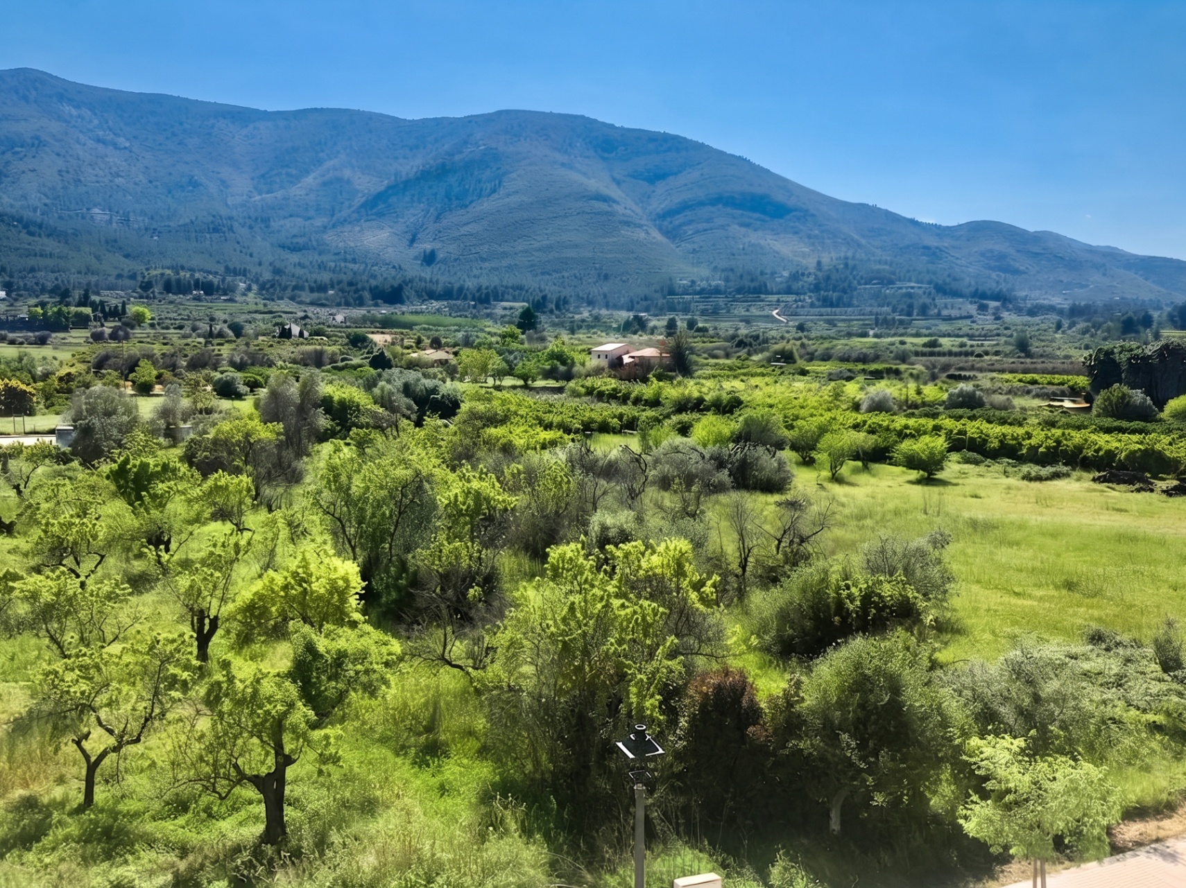 12734DR - Light apartment with two bedrooms, a private rooftop terrace, and mountain views in Parcent.