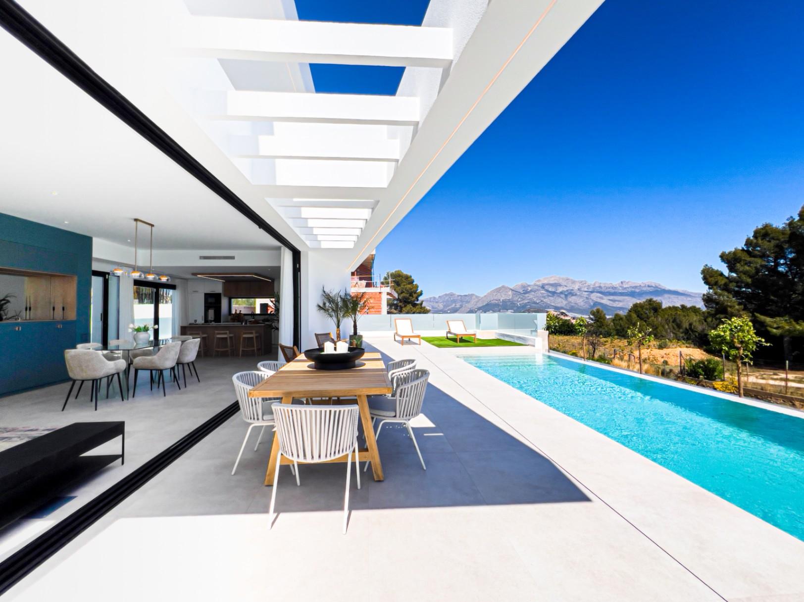 1233DA - Nouvelle villa contemporaine avec piscine à débordement à Polop – première de 46 achevées