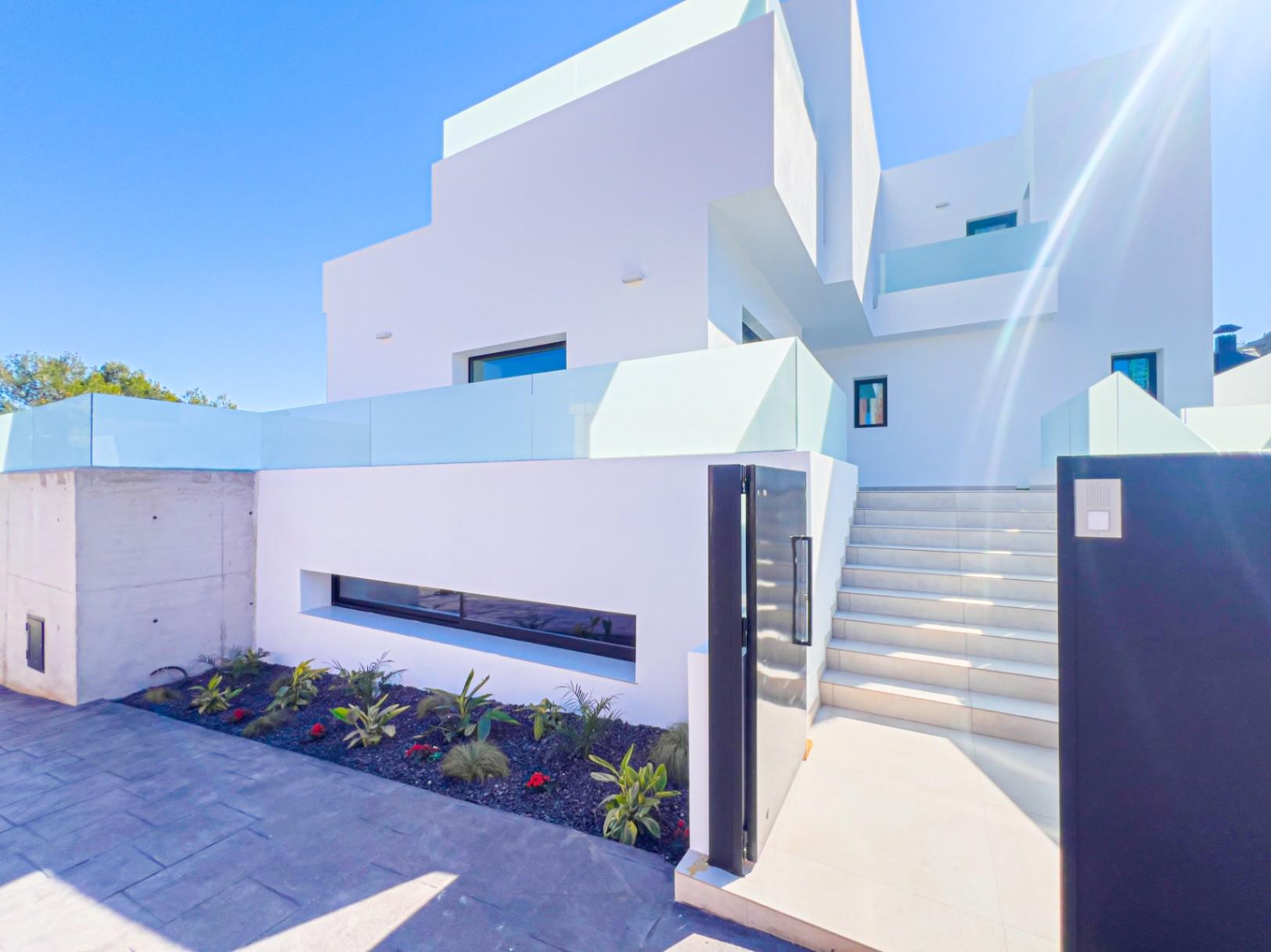 1233DA - Nouvelle villa contemporaine avec piscine à débordement à Polop – première de 46 achevées