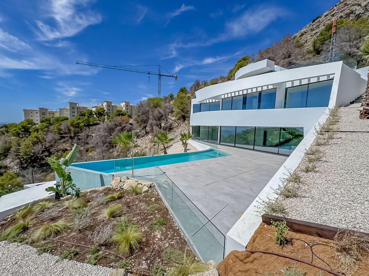 1298DA - Villa de luxe avec vue sur mer, architecture élégante et design moderne, située dans les collines d'Altea.
