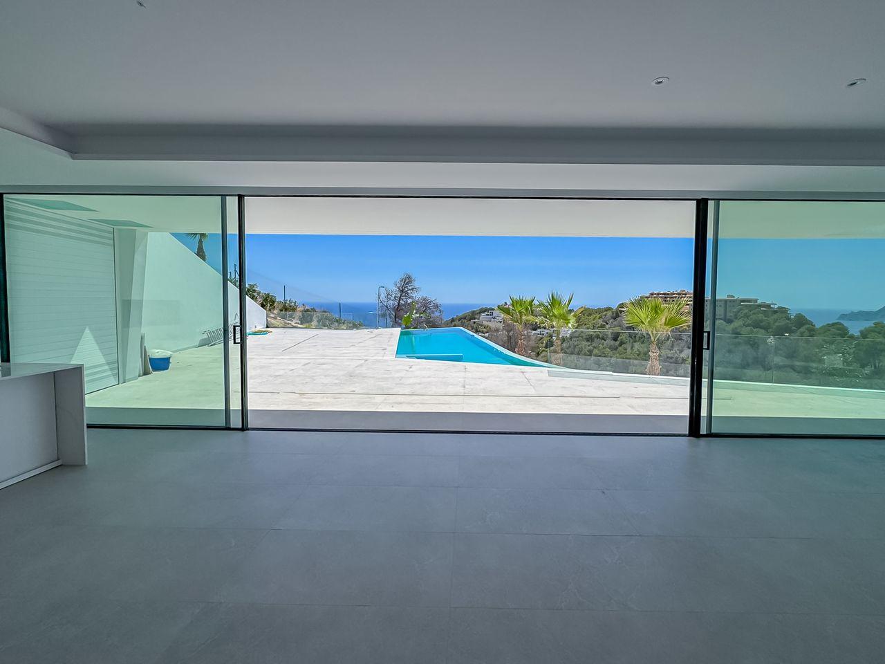 1298DA - Villa de luxe avec vue sur mer, architecture élégante et design moderne, située dans les collines d'Altea.