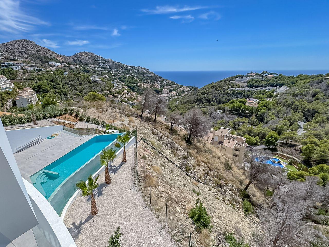 1298DA - Villa de luxe avec vue sur mer, architecture élégante et design moderne, située dans les collines d'Altea.