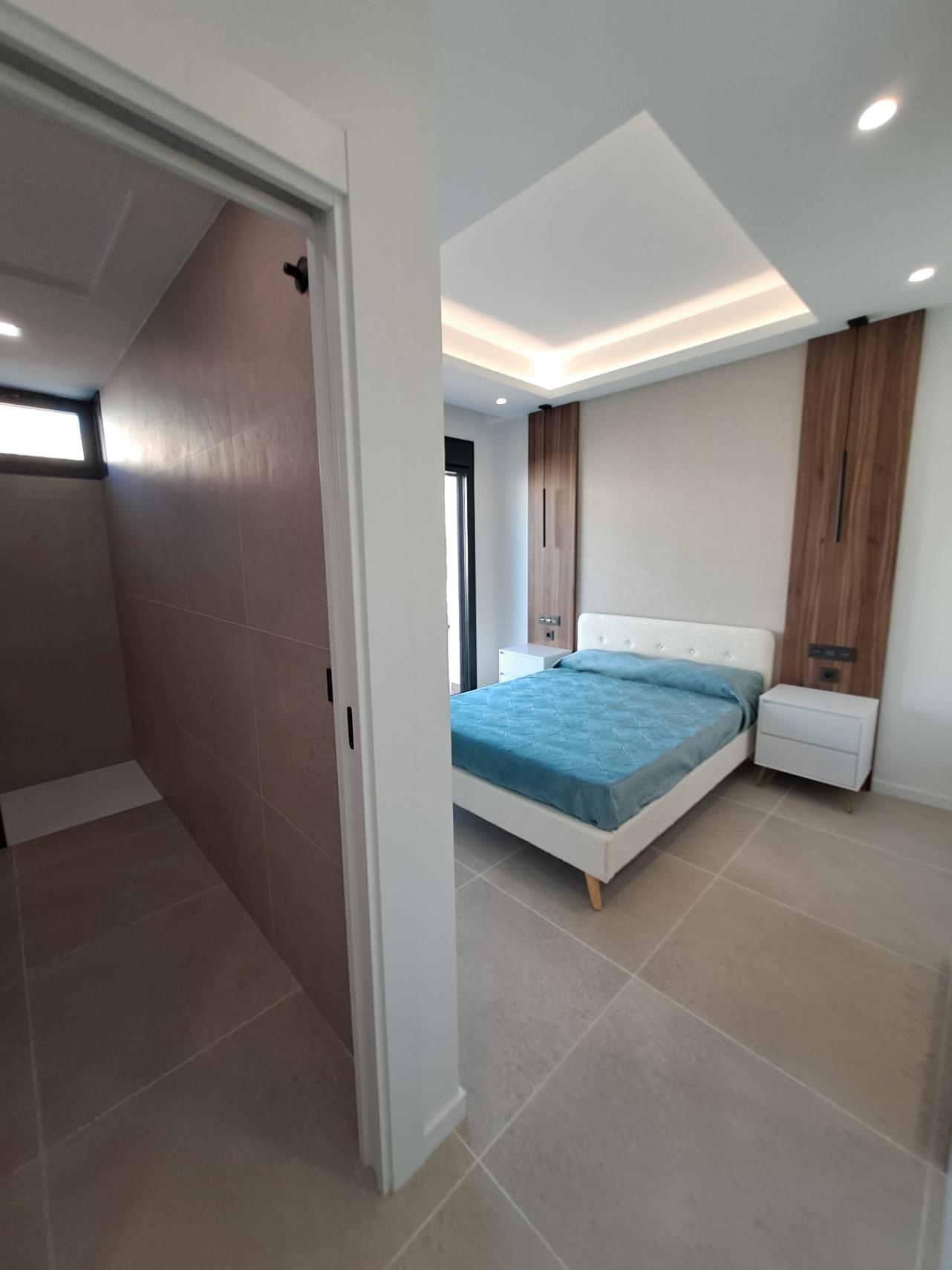 1317DA - Villas unifamiliales modernas en construcción, de una sola planta y de calidad, con vistas a la montaña en Polop.