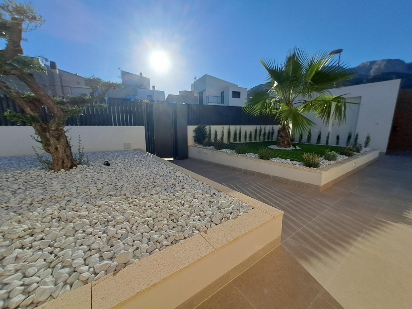 1317DA - Villas unifamiliales modernas en construcción, de una sola planta y de calidad, con vistas a la montaña en Polop.