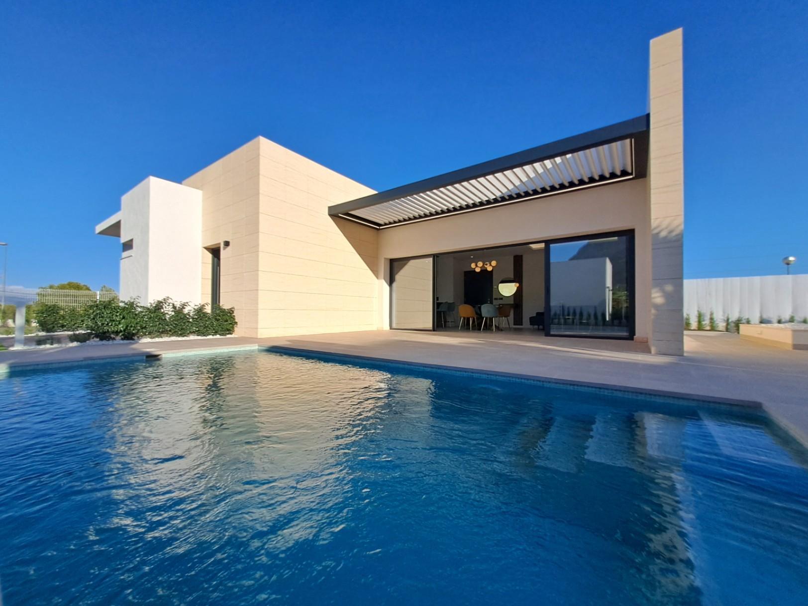1317DA - Villas unifamiliales modernas en construcción, de una sola planta y de calidad, con vistas a la montaña en Polop.