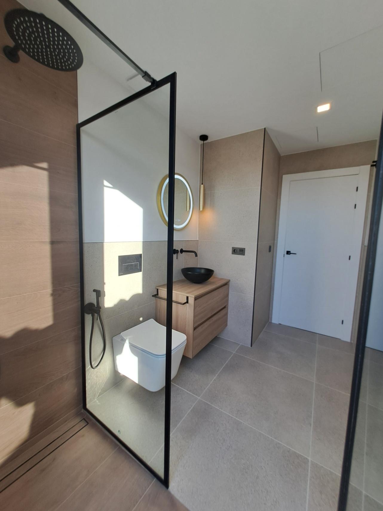 1317DA - Villas unifamiliales modernas en construcción, de una sola planta y de calidad, con vistas a la montaña en Polop.