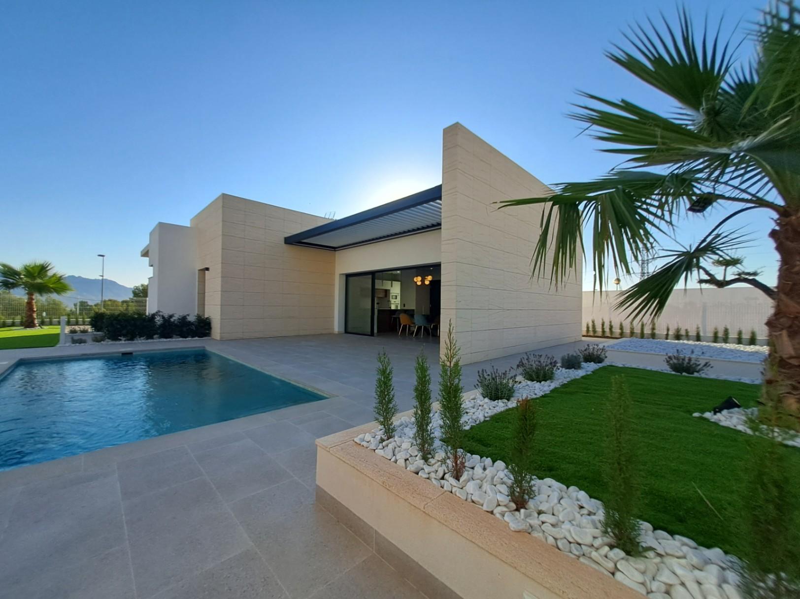1317DA - Villas unifamiliales modernas en construcción, de una sola planta y de calidad, con vistas a la montaña en Polop.