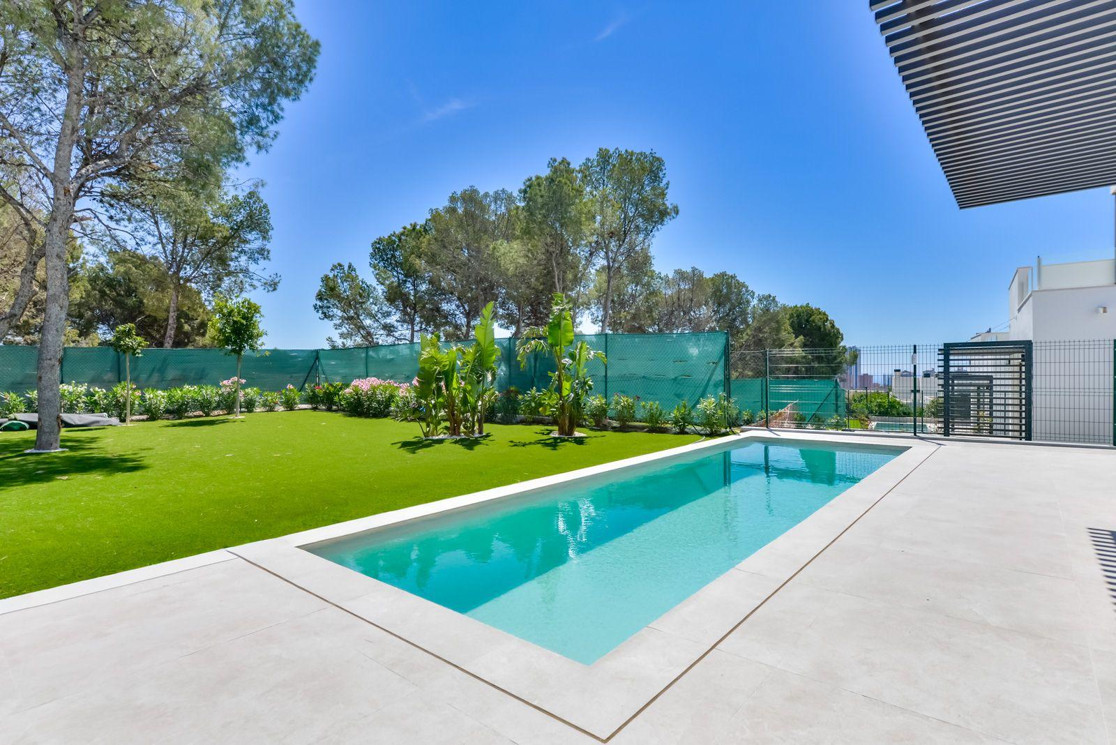 1409DA - Villas modernas listas para habitar con amplios interiores y jardines paisajísticos.